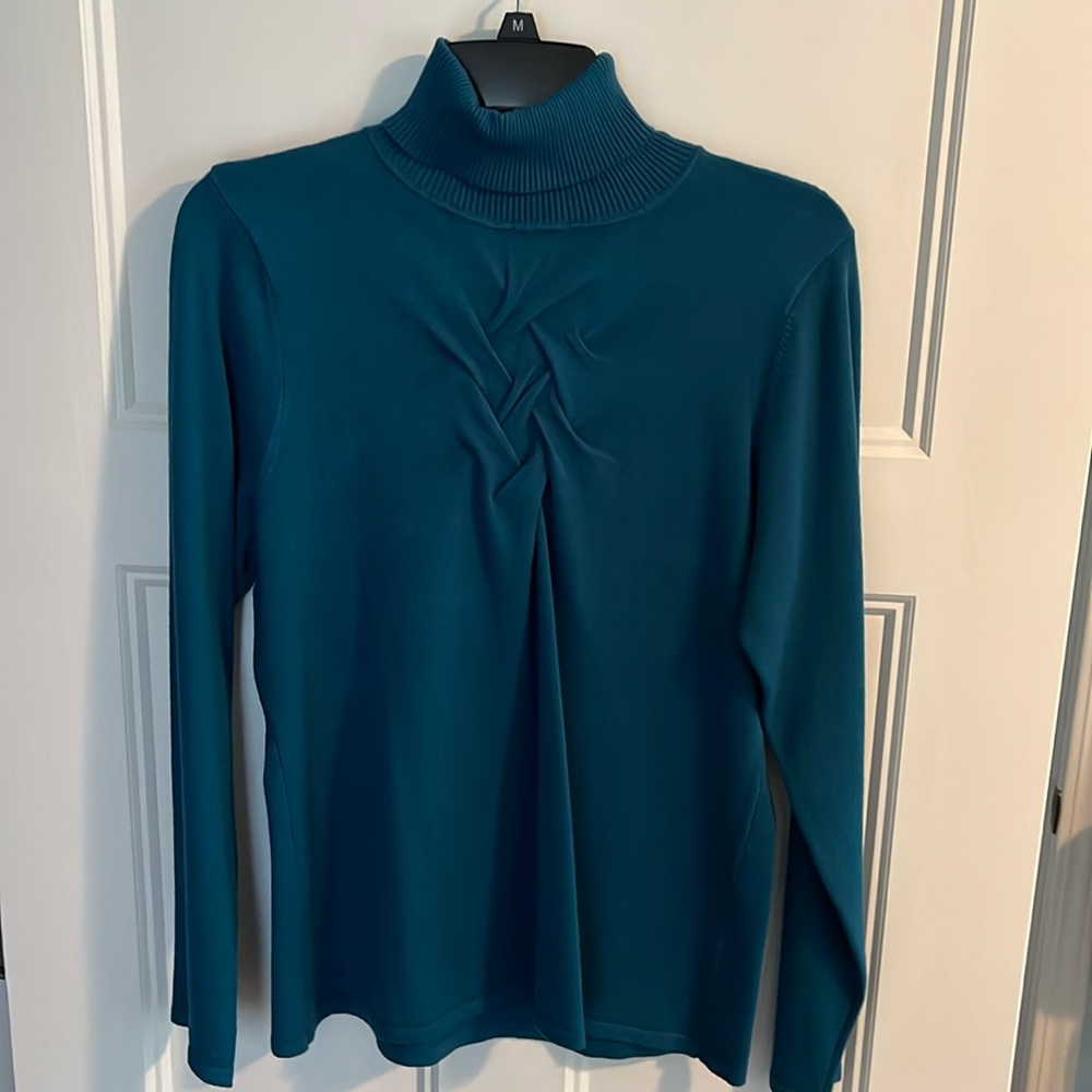Beautiful turquoise turtleneck sweater!